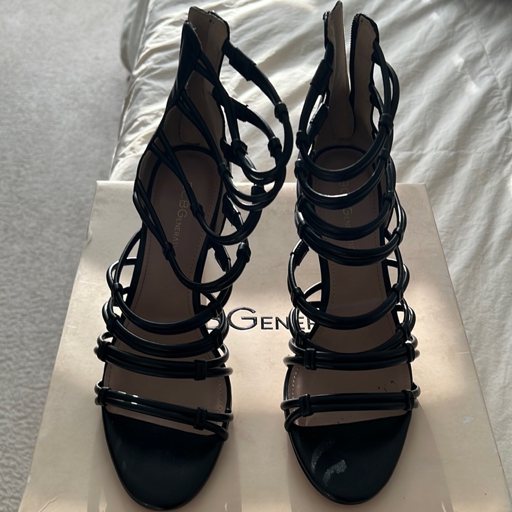 Black strappy open toe sandals.